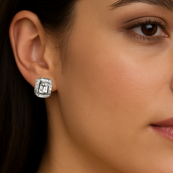 Close-up of a woman wearing a silver earring.