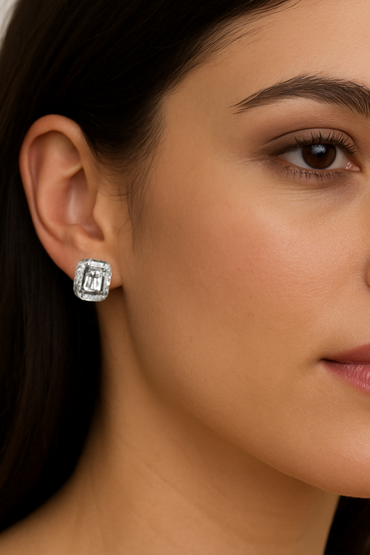 Close-up of a woman wearing a silver earring.