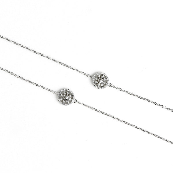 Silver anklet payal with a small circular design on a white background