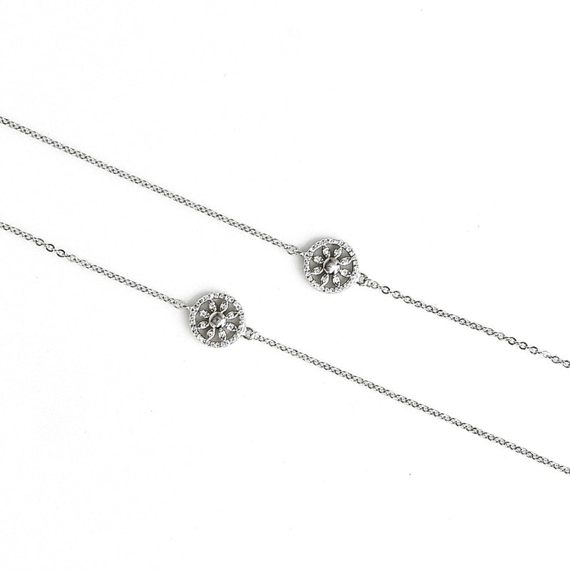 Silver anklet payal with a small circular design on a white background
